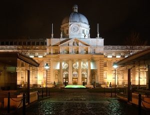Government Buildings by night, via Wikipedia