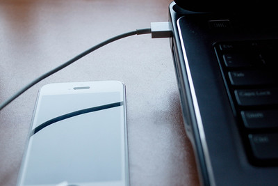 Phone cable laptop; via Flickr